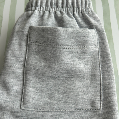 PANTALON BUZO GRIS CLARO