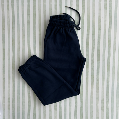 PANTALON BUZO GRIS CLARO