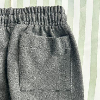 PANTALON BUZO GRIS CLARO