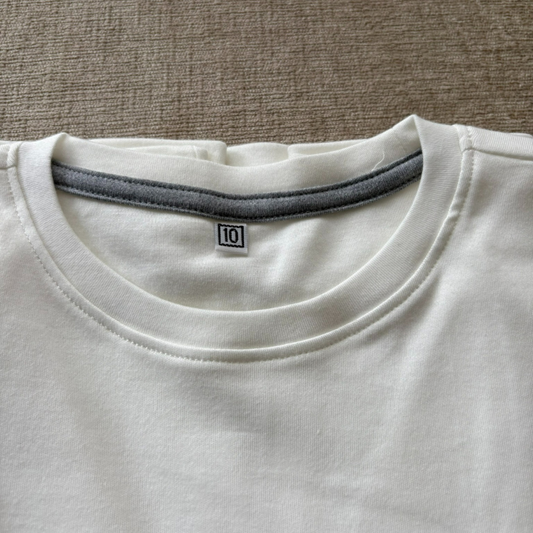 POLO MANGA LARGA COLOR ENTERO BLANCO